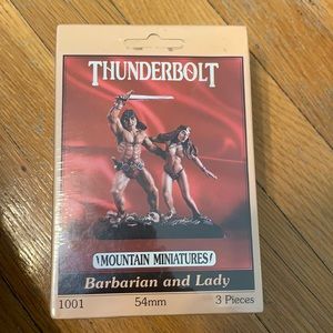 Thunder bolt Mountain Miniatures Barbarian & lady